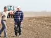 father and son working in agriculture